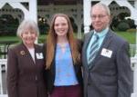 Male & female scholarship donors with female student